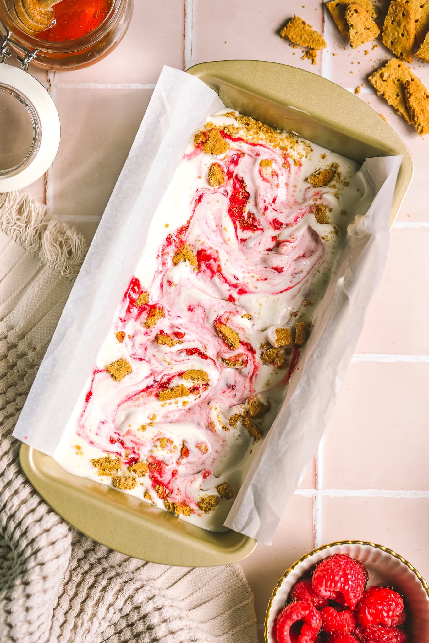 raspberry and graham crackers swirled through vanilla ice cream