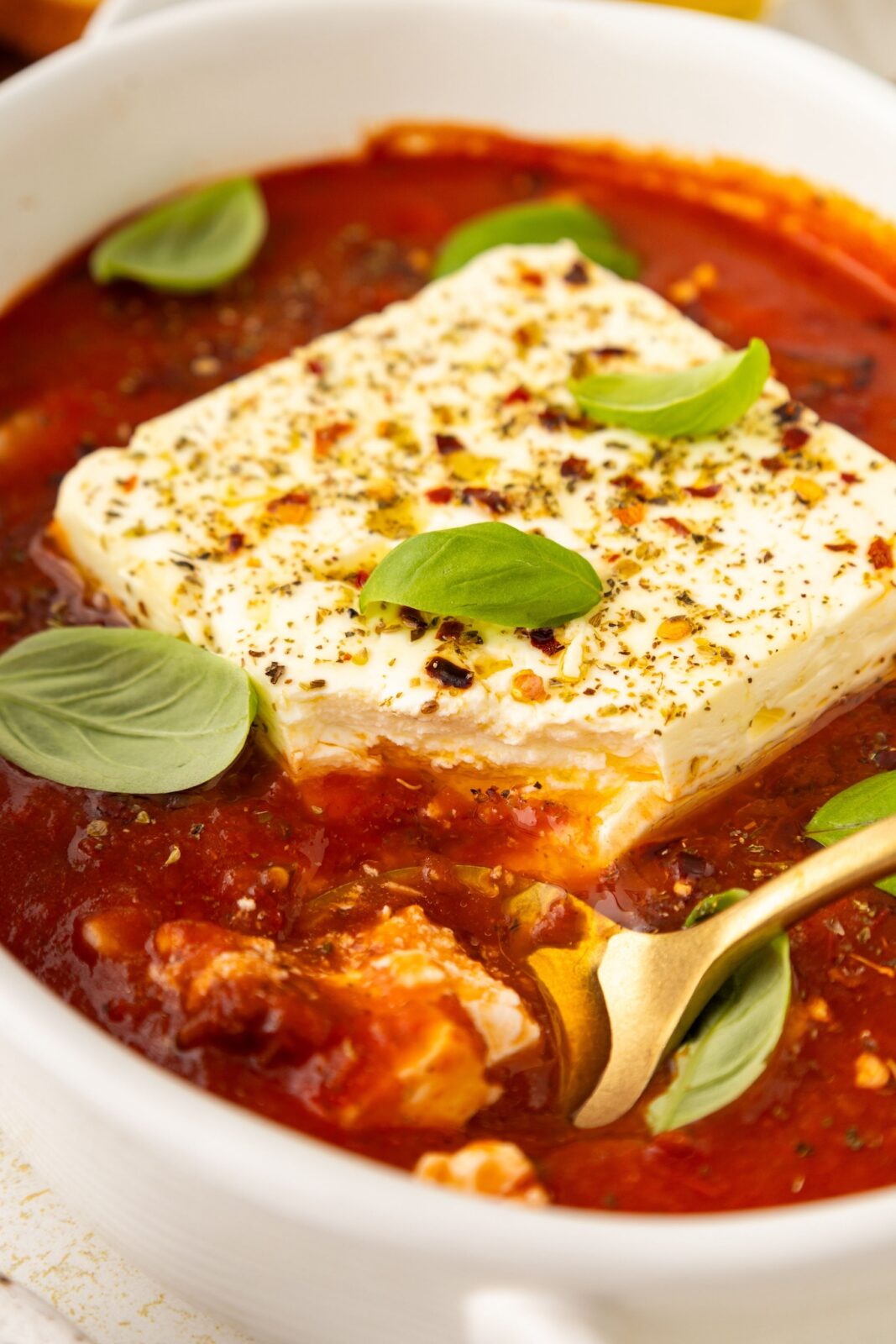 spoon serving baked feta