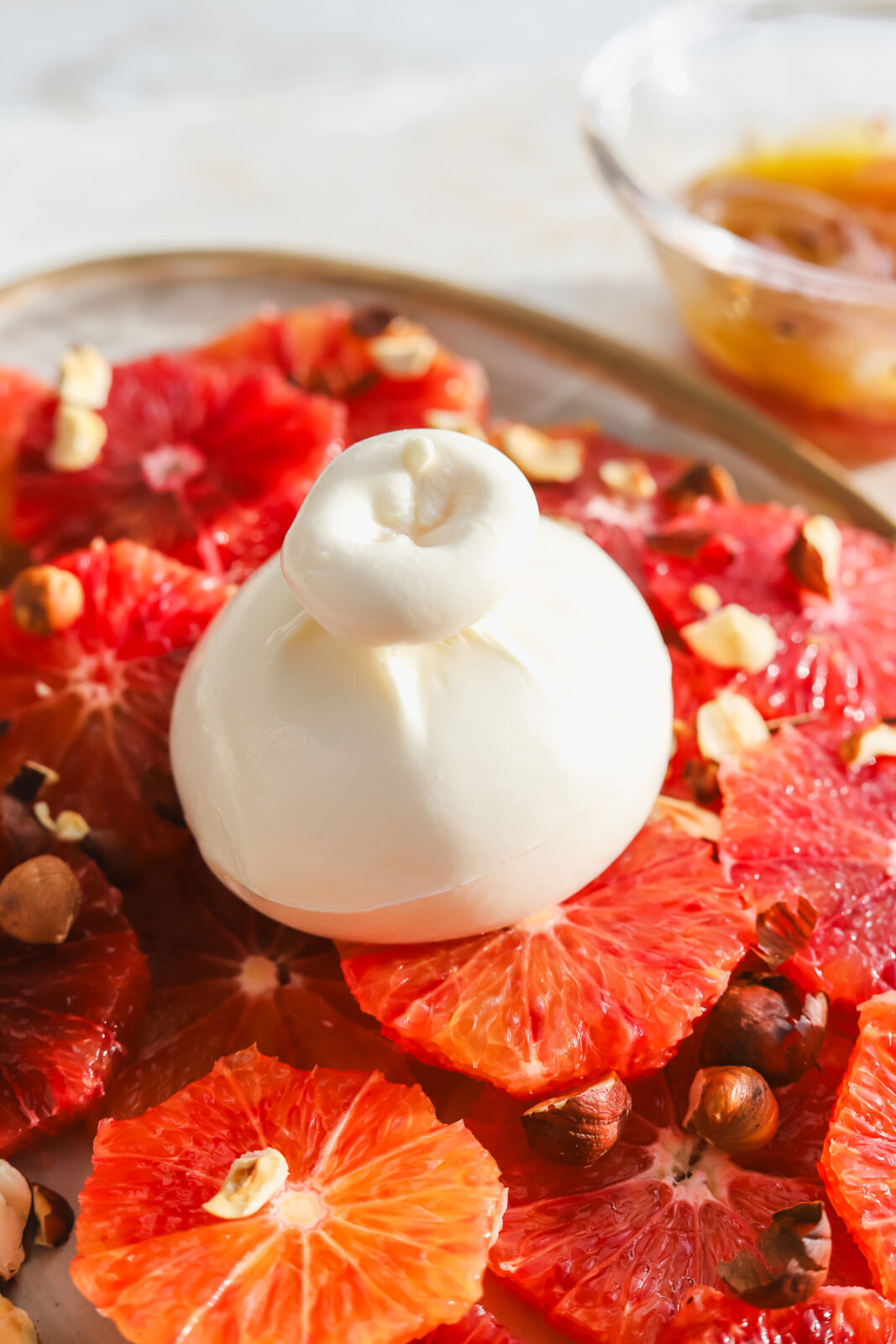 side angle of ball of burrata cheese